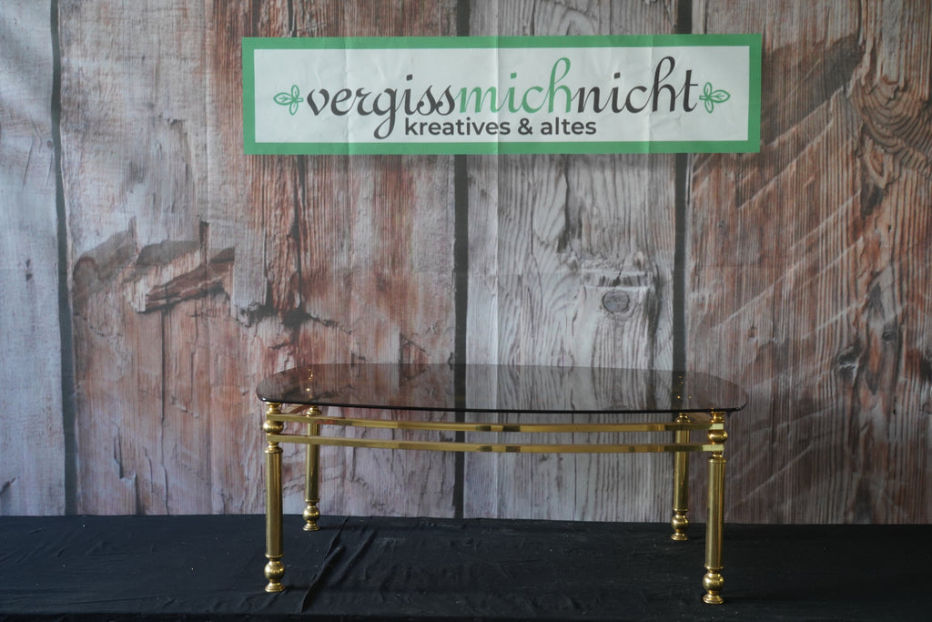 Goldener Sofatisch mit Glasoberfläche