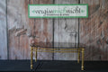 Goldener Sofatisch mit Glasoberfläche